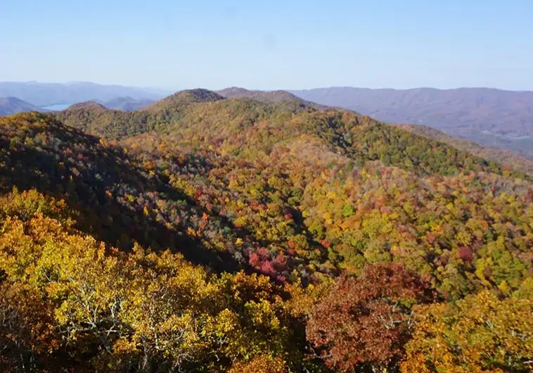 A view of the mountains from above in autumn.
